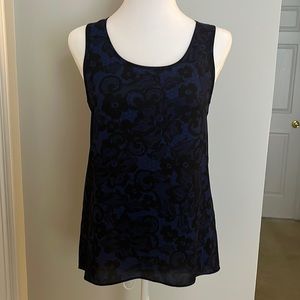 Express blue and black floral open back tank. Size XS.